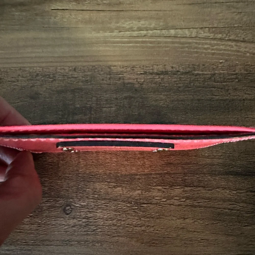 kate spade New York Coral/Pink Travel Wallet. NWOT.